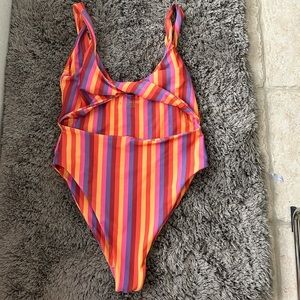 SKATIE size large striped one piece suit, barely worn